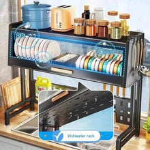 Black kitchen sink dish rack with blue drying airflow over dual sink and utensil tray