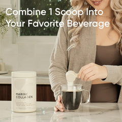 Woman adding a scoop of marine collagen peptides powder to a hot beverage with container on counter