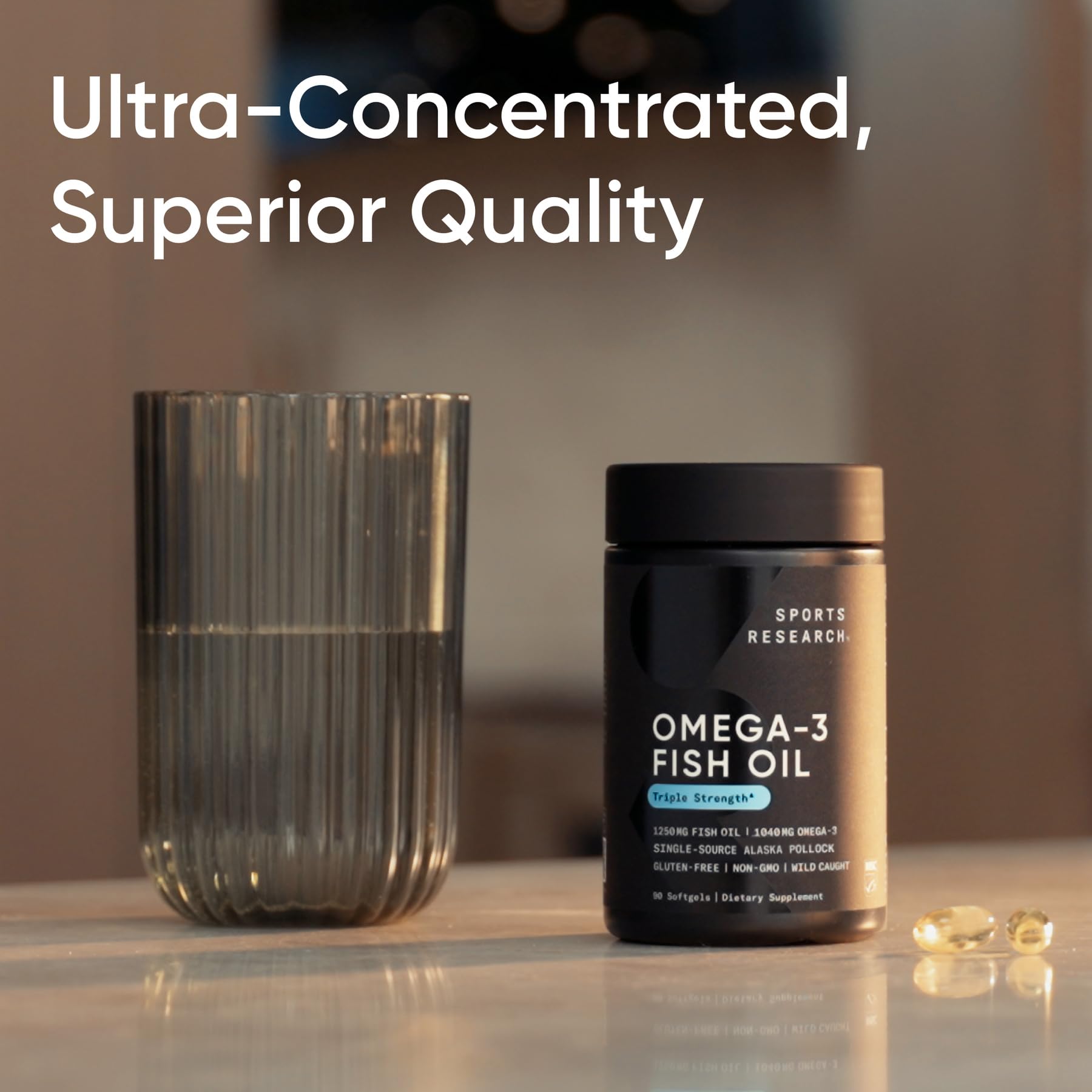 Sports Research triple strength omega 3 fish oil supplement in a black container beside a glass of water