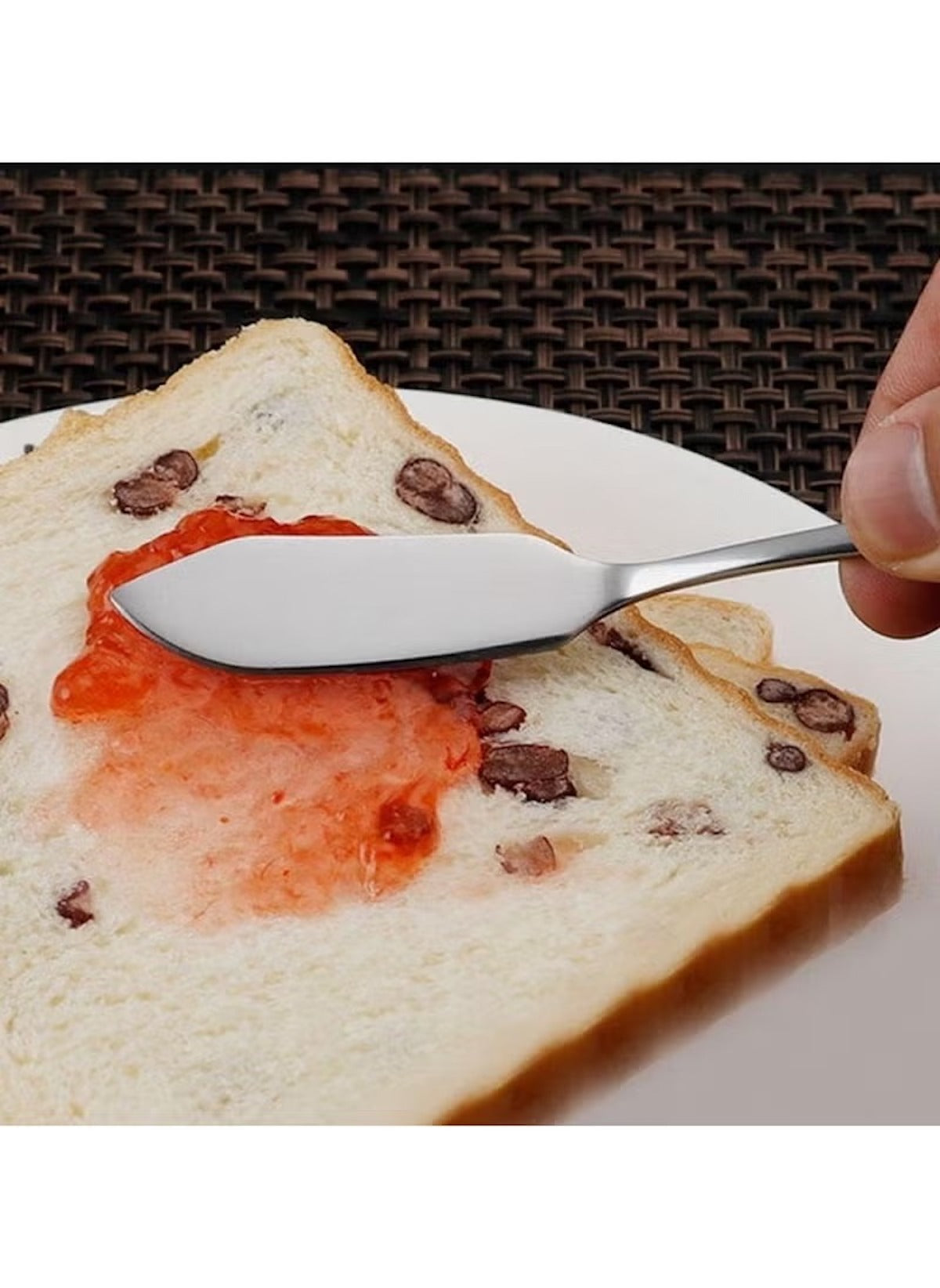 Huitich stainless steel butter knife set spreading jam on raisin bread slice