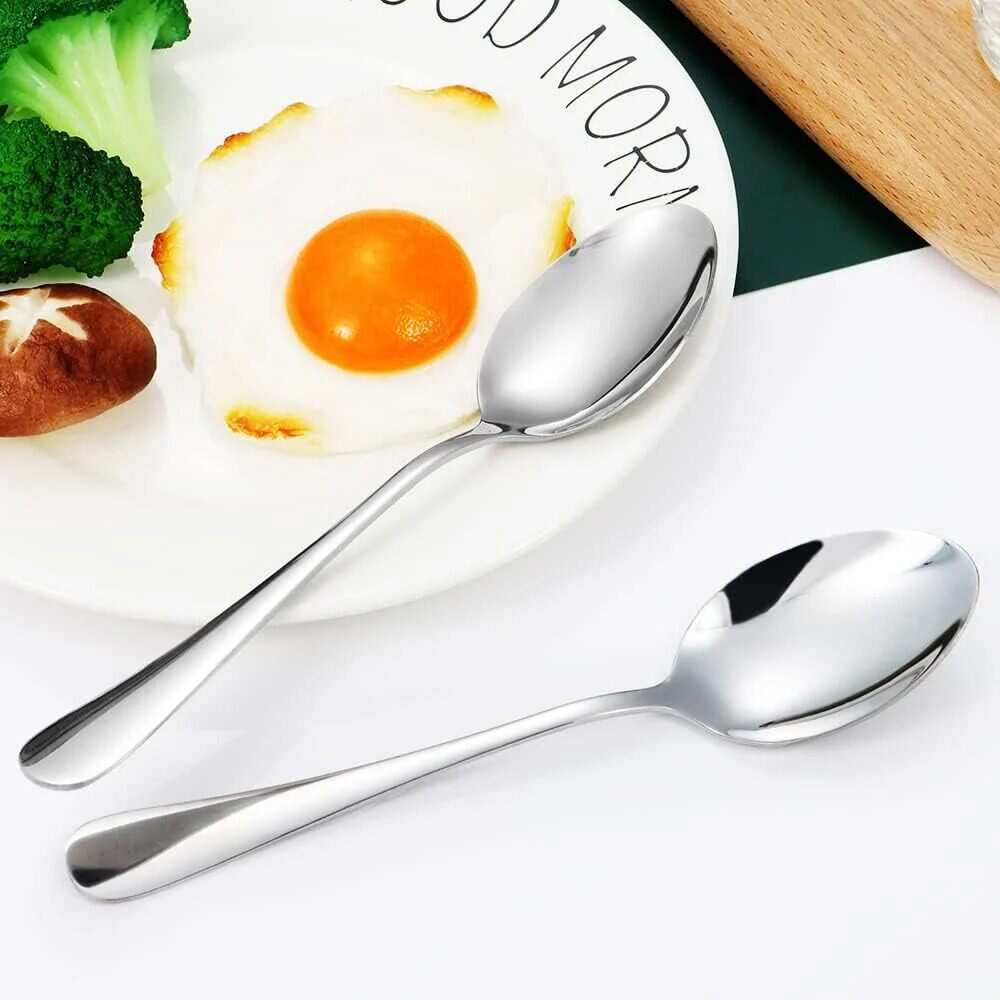 Huitich stainless steel dinner spoon set with high-quality polished finish on a breakfast plate