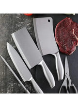 Stainless knives with black handles and varied blade shapes on a dark surface