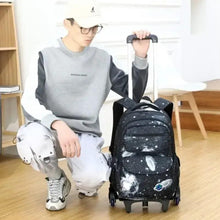 Kids rolling school backpack, black starry galaxy print with front pocket, wheels, and handle