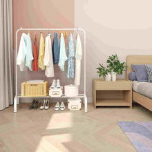 White garment rack with hanging shirts and lower shoe shelf, plus wicker storage bin