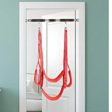 Doorway pull up bar with red suspension straps and hanging loops