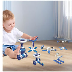 Child playing with blue and white 6-in-1 STEM robot toy by Huitich on wooden floor
