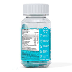 SugarBearHair supplement bottle back label visible with teal vegan hair vitamins gummies inside