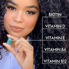 Model holding teal gummy with curly hair beside text listing Biotin Vit D Vit E Vit B6 B12 vegan hair vitamins gummies