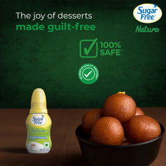 Sugar Free Natura sugar free sweetener drops bottle beside bowl of gulab jamun on green promotional backdrop