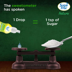 Sugar Free Natura bottle releasing sugar free sweetener drops on scale opposite teaspoon of sugar