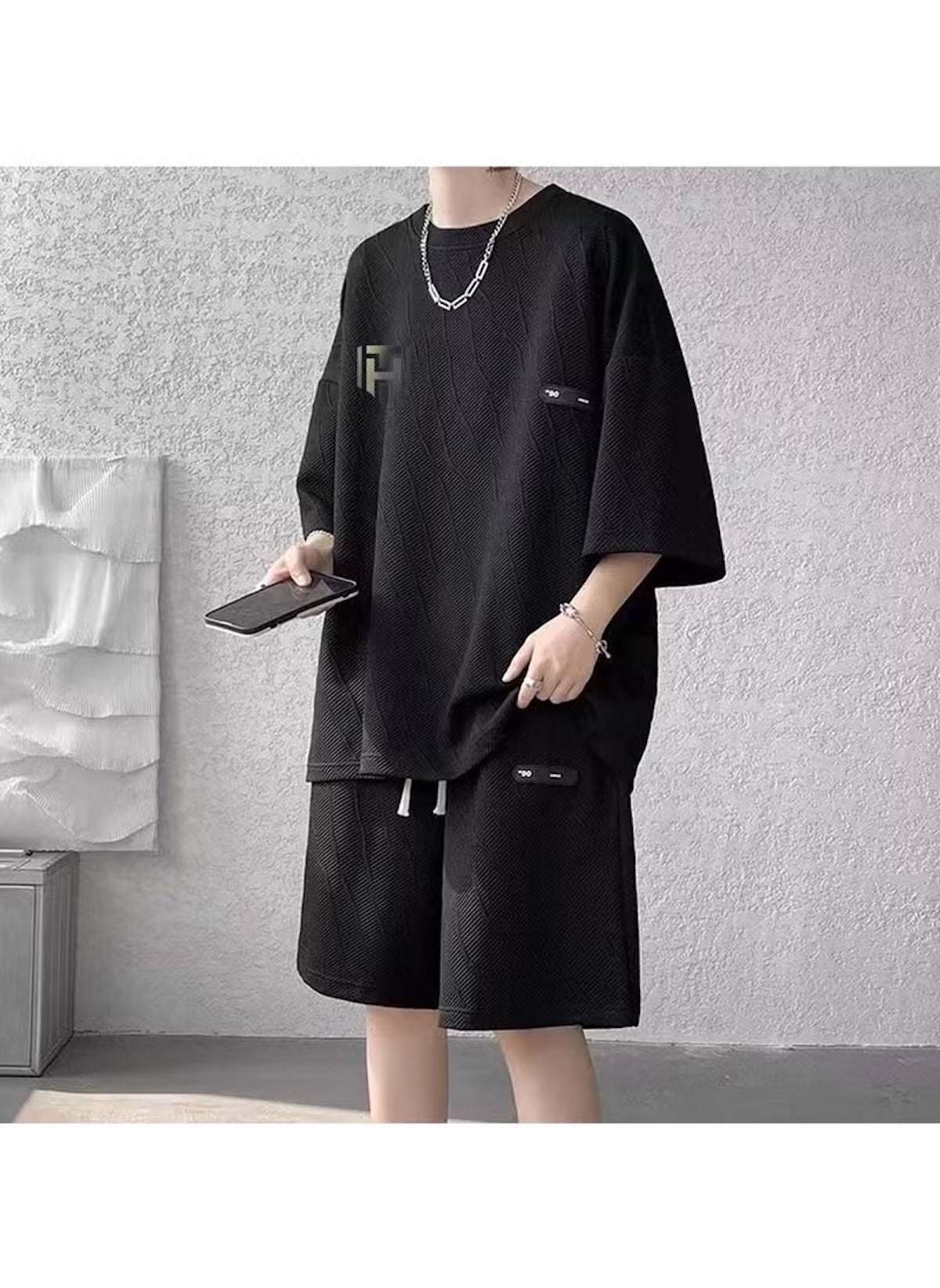 Black summer activewear set for men online featuring loose fit shorts and oversized t-shirt by Huitich