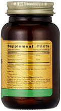 Probiotic supplement bottle with gold Supplement Facts panel