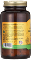 Amber glass bottle of calcium magnesium zinc vitamin d tablets with gold lid and visible tablets
