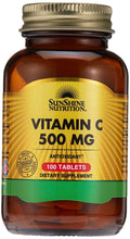 Vitamin C 500 mg dietary supplement bottle, 100 tablets label on amber bottle