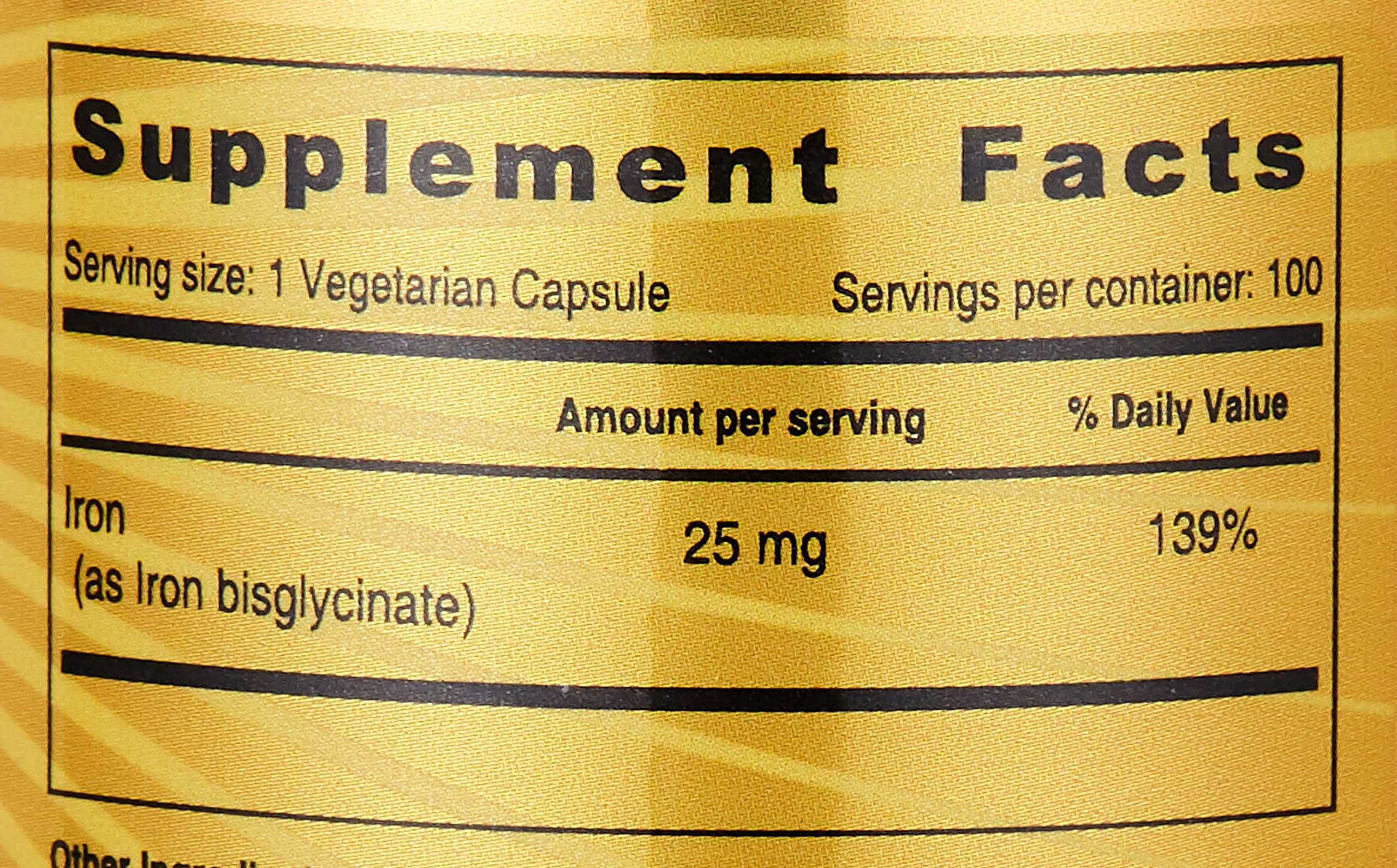Close up of supplement facts showing iron 25 mg per vegetarian capsule label Sunshine Nutrition Iron 25 Mg, 100 Capsules.
