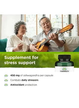 Ashwagandha supplement bottle with green label beside elderly couple relaxing outdoors