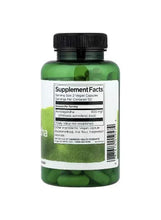 Ashwagandha capsules bottle back, green bottle with Supplement Facts panel