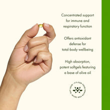 Oregano oil softgel held in a person’s hand