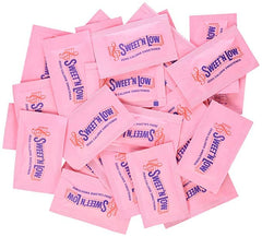 Pile of Sweet N Low pink single serve packets showing Sucralose zero calorie sweetener