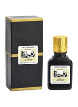 Oud perfume bottle with box, dark glass and gold cap, Swiss Arabian label, 9 ml
