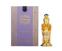 Swiss Arabian Rasheeqa perfume oil bottle with ornate gold design and purple decorative box