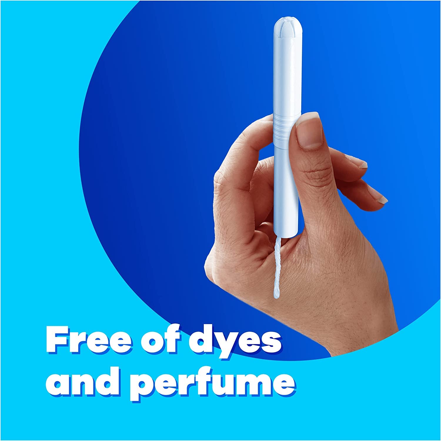 Tampax Compak Super Plus tampons white applicator held in hand on blue background with Free of dyes and perfume text