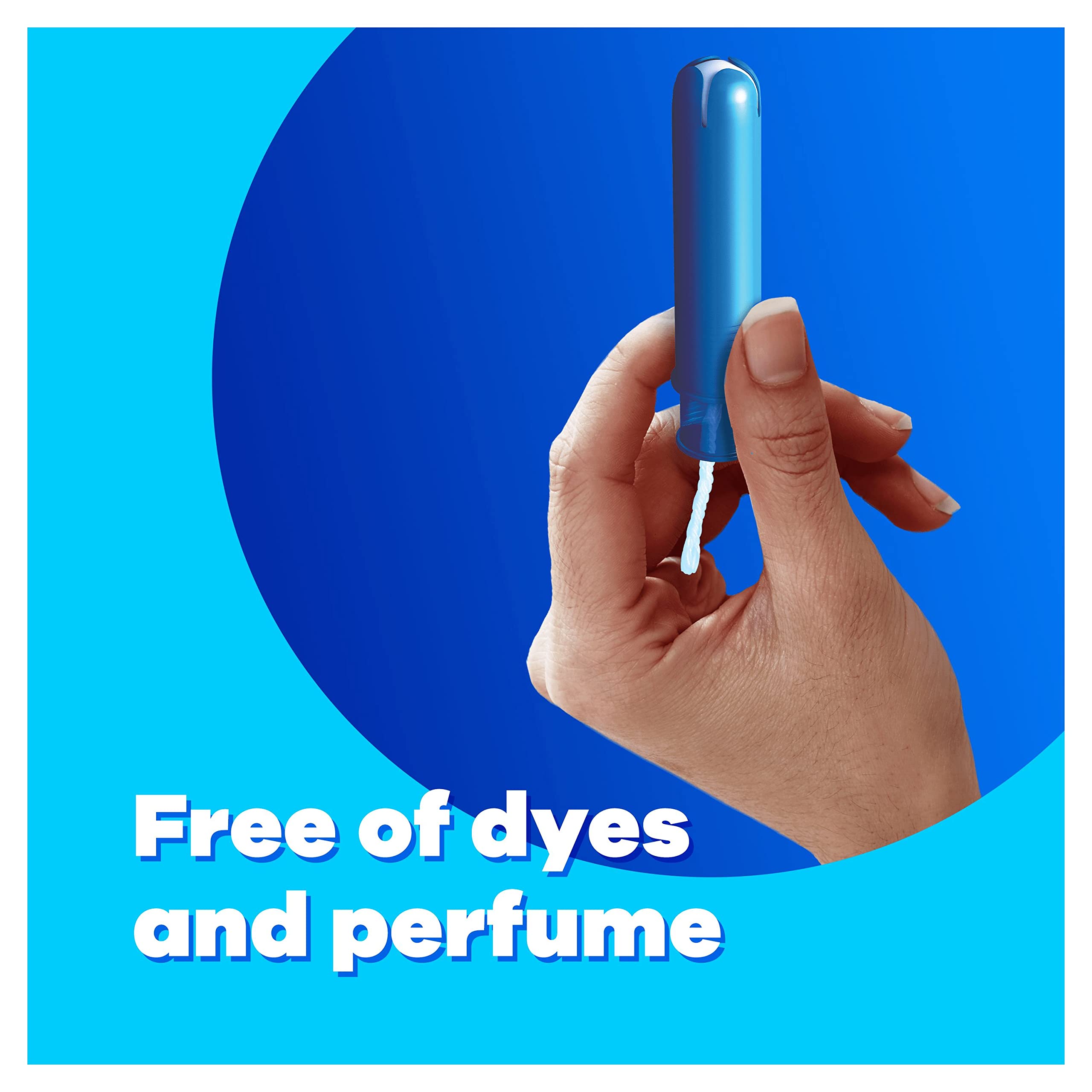 Hand holding blue applicator tampon against blue background with Free of dyes and perfume text Tampax Compak Super tampons UAE