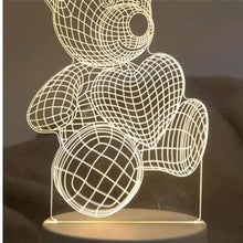3D LED teddy bear night light with white wireframe grid, close-up on base
