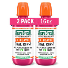 Oral rinse 2-pack bottles with orange caps, pink liquid, Sparkle Mint label
