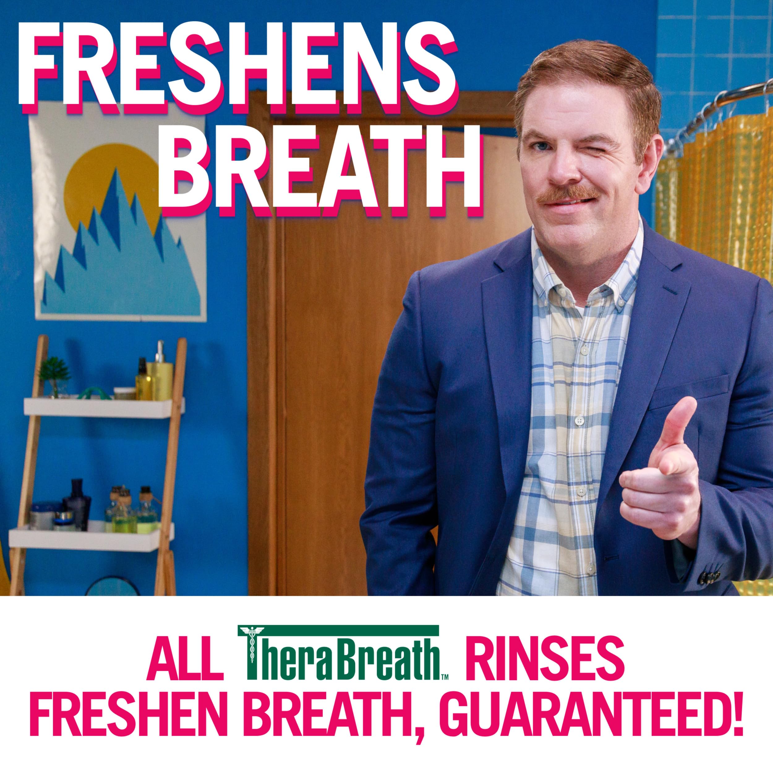 Man winking and pointing in a colorful bathroom ad for TheraBreath oral rinse for bad breath. Freshens Breath signage