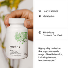 THORNE Berberine supplement bottle held in hand with white label showing heart vessels and metabolism benefits