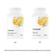 Two white supplement bottles with gold turmeric graphics and THORNE branding, new vs old
