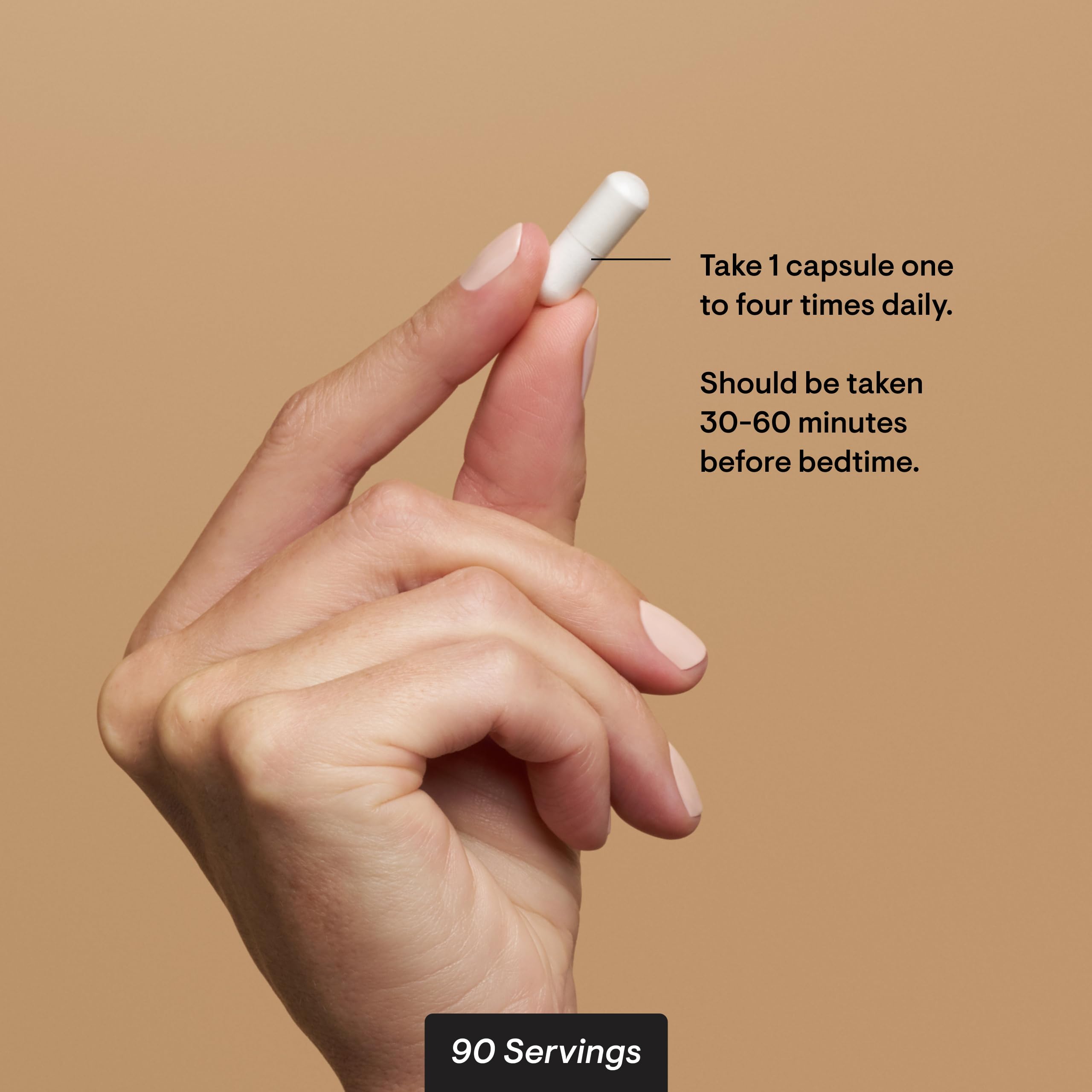 THORNE Magnesium Glycinate Supplement UAE shown with a hand holding a capsule for daily use