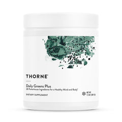 Thorne Daily Greens Plus powder in white tub with green label art dietary supplement for immune and nutrient support