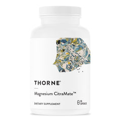 White bottle of THORNE magnesium citrate malate supplement dietary capsules with abstract geometric label