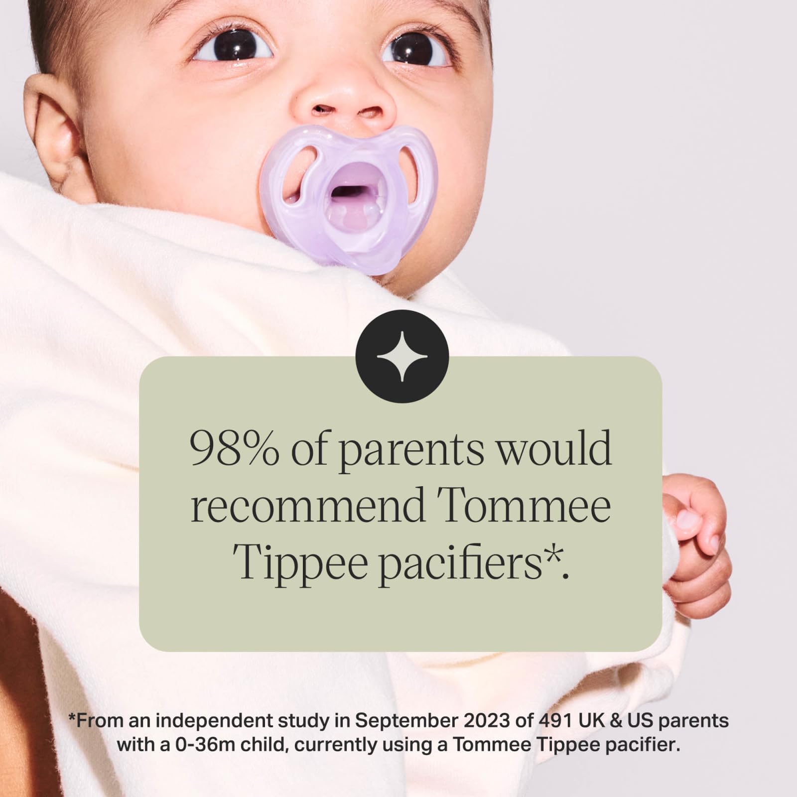 Tommee Tippee silicone soother 0-6 months lavender pacifier in baby mouth with 98 percent of parents recommending it