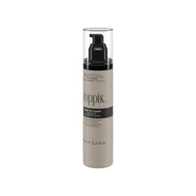 Toppik Hair Fattener serum bottle back, black pump, beige tube, barcode label