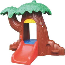 Plastic treehouse playset with green roof and red slide