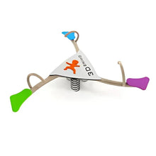 Kids spring seesaw ride with triangular white center, orange figure decal, bent handles