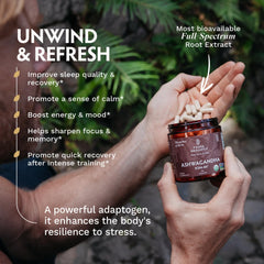 TRIBE ORGANICS jar of Ashwagandha KSM-66 capsules UAE poured into hand against outdoor greenery