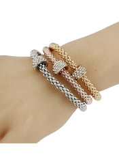 Huitich triple tone crystal bracelets set in silver, rose gold, and gold on wrist