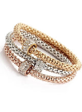 Triple tone crystal wrap bracelets set with jeweled clasp, gold, silver and rose tones