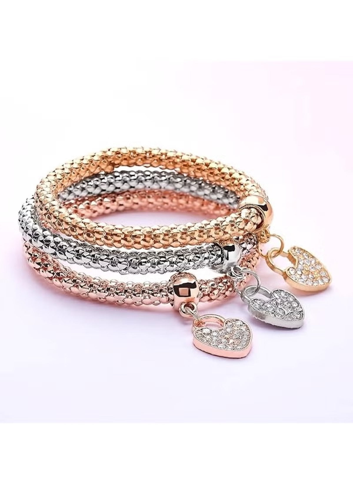Huitich triple tone love charm bracelets with heart-shaped crystal pendants in gold, silver, and rose gold