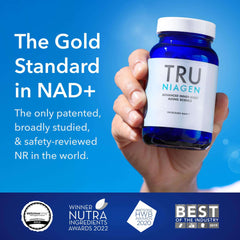 TRU NIAGEN blue glass bottle with white cap held in hand on blue background nicotinamide riboside supplement