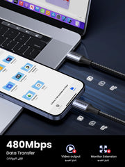 UGREEN fast charging USB C to Type C cable connected between laptop and smartphone for high-speed data transfer