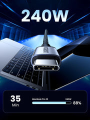 Fast charging USB C to Type C cable 240W powering a laptop and smartphone with quick charge indicator