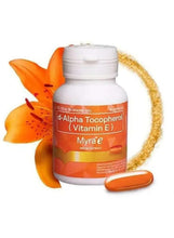 Vitamin E softgel bottle with orange label and a few softgels on side
