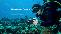 Scuba diver using Ulefone Armor 22 rugged smartphone to take underwater photos of coral reef