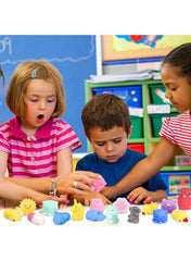 Children playing with a colorful unicorn squishy toy set for fun and creative activity