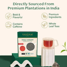 VAHDAM Daily Assam black tea box with cup of red tea and tea infuser
